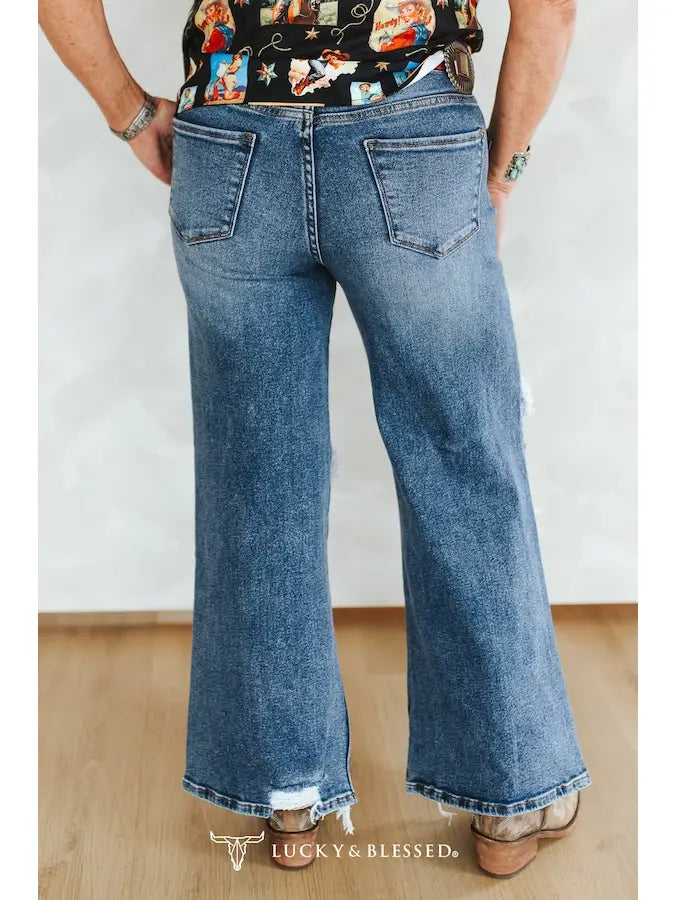 Mid Wash Distressed Mid Rise Wide Leg Frayed Jeans 30in